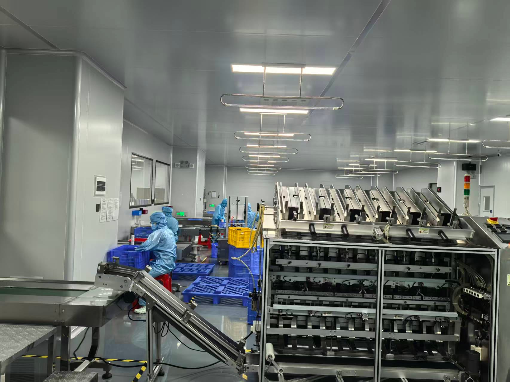 Automated sheet-mask filling, sealing and sachet packaging line